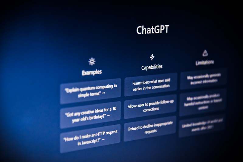 Minimalist laptop showing clean ChatGPT interface with highlighted prompt input field and structured response
